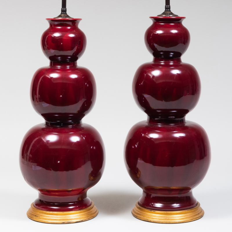 Appraisal: PAIR OF GOURD SHAPED RED GLAZED POTTERY VASES MOUNTED AS