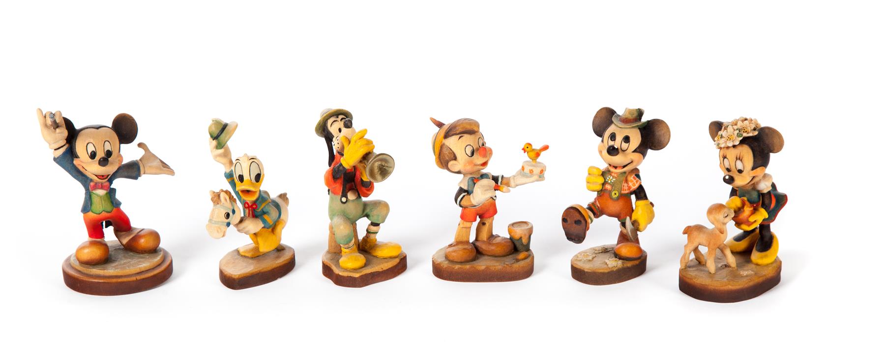 Appraisal: SIX ANRI WOOD CARVED DISNEY-THEMED FIGURES Italy rd quarter- th