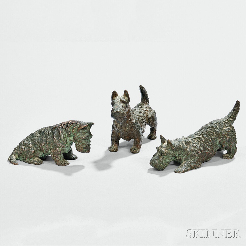 Appraisal: Marguerite Kirmse American - Three Bronze Scottie Dogs One Seated