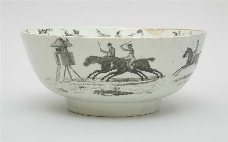 Appraisal: ENGLISH BLACK TRANSFER-PRINTED HUNT BOWL The exterior with four vignettes