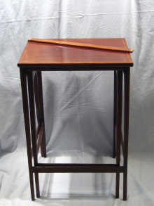 Appraisal: A nest of three Edwardian mahogany tables with satinwood crossbanding