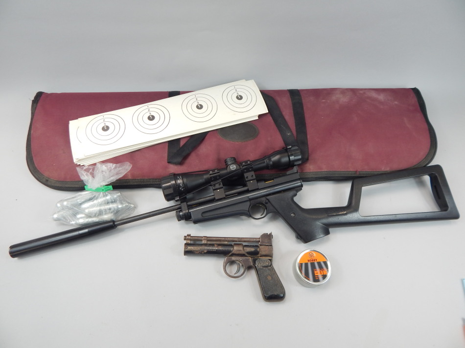 Appraisal: A Crosman air gun and a Webley air pistol