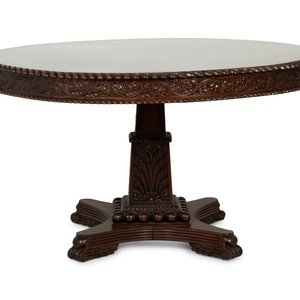 Appraisal: An Anglo-Indian Carved Padouk Wood Tilt Top Center Table TH