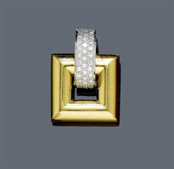 Appraisal: DIAMOND AND GOLD PENDANT White and yellow gold g Modern