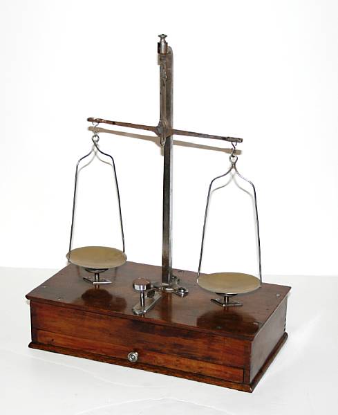 Appraisal: An English steel brass and mahogany pharmaceutical scale early th