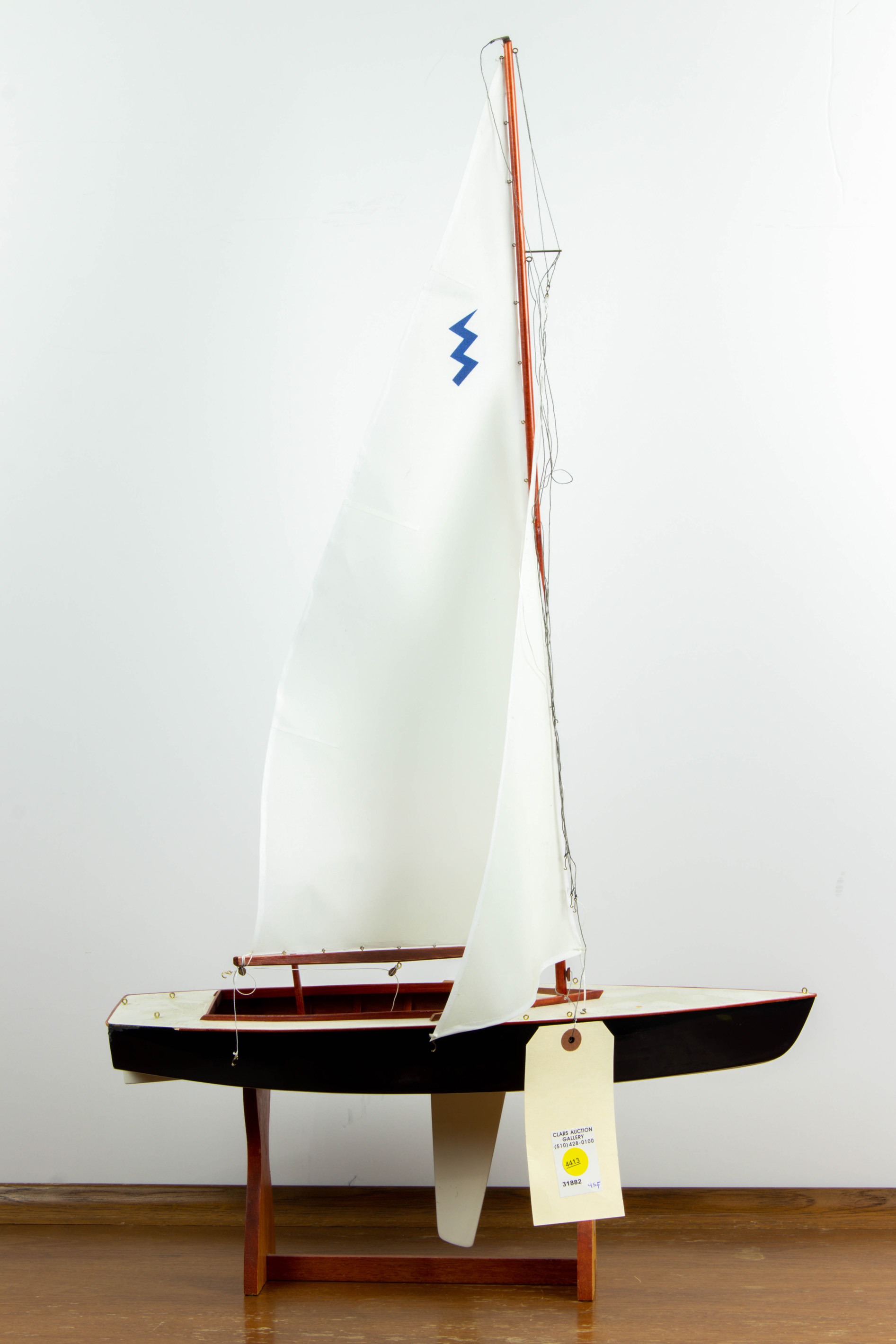 Appraisal: HAND BUILT SCALE MODEL OF A SAILBOAT ON STAND Hand