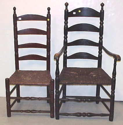 Appraisal: Two ladderback chairs one armchair with four arched splats and