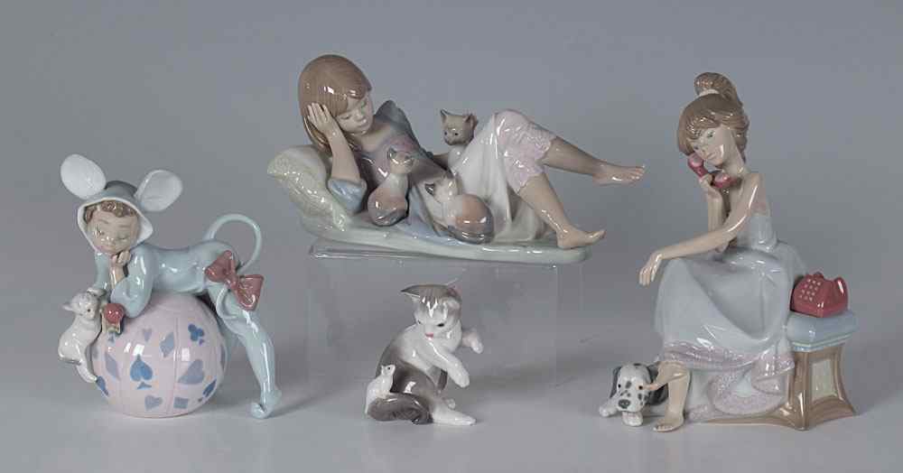 Appraisal: FOUR LLADRO PORCELAIN FIGURINES To include CHIT-CHAT glazed Juan Huerta