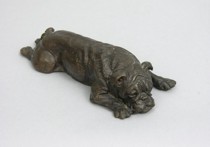 Appraisal: Doris Lindner Welsh Plaster recumbent bulldog with bronze patina Marked