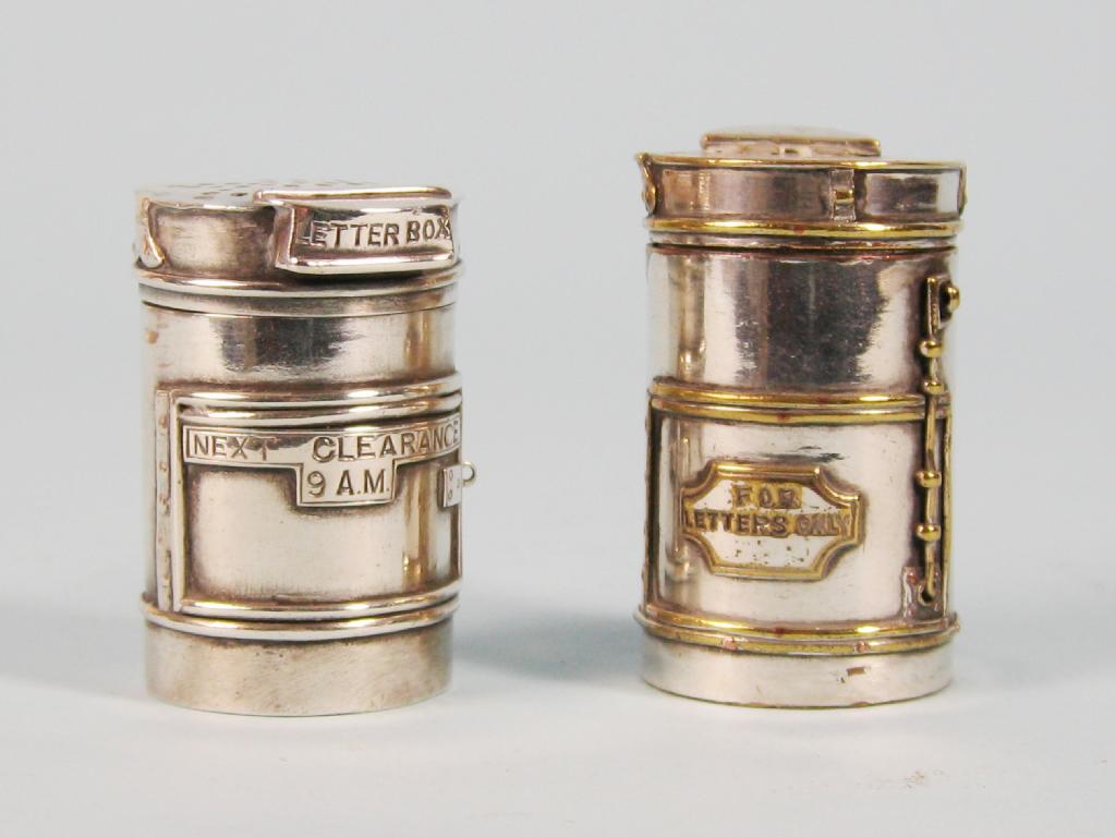 Appraisal: Two Victorian plated Novelty Salt Pepper Pots modeled as letter