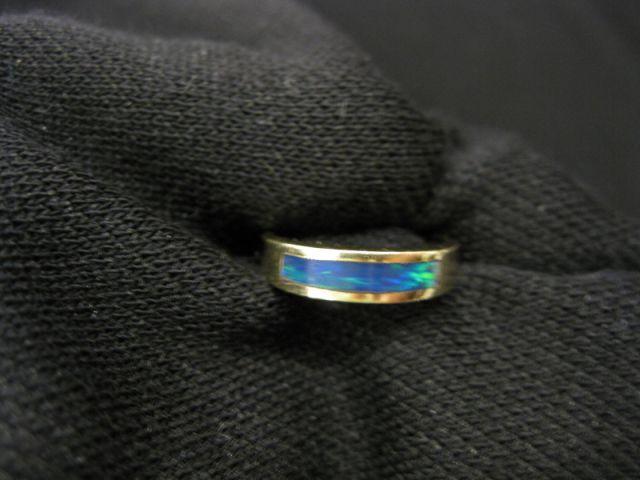 Appraisal: Black Opal Band fiery opal in k yellow gold