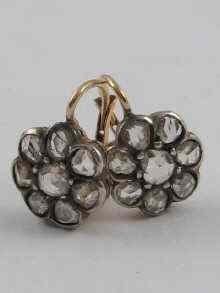 Appraisal: A pair of rose cut diamond cluster earrings set in