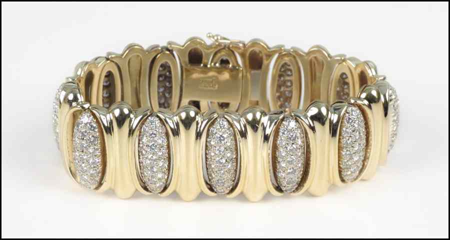 Appraisal: DIAMOND AND KARAT YELLOW GOLD BRACELET round brilliant diamonds are