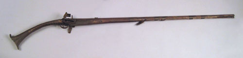 Appraisal: Middle Eastern flintlock rifle approx caliber part round-part octagonal barrel