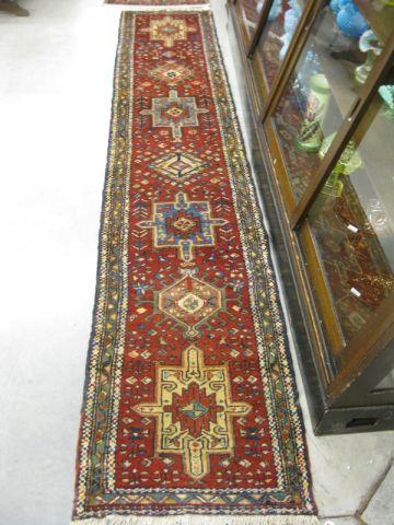 Appraisal: Heriz Persian Handmade Runner geometric medallions stylized floral border red