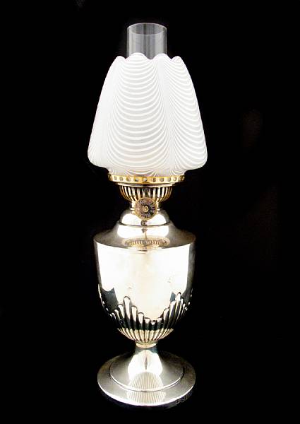 Appraisal: A Victorian silver small kerosene lamp with glass shadeEdward Hutton