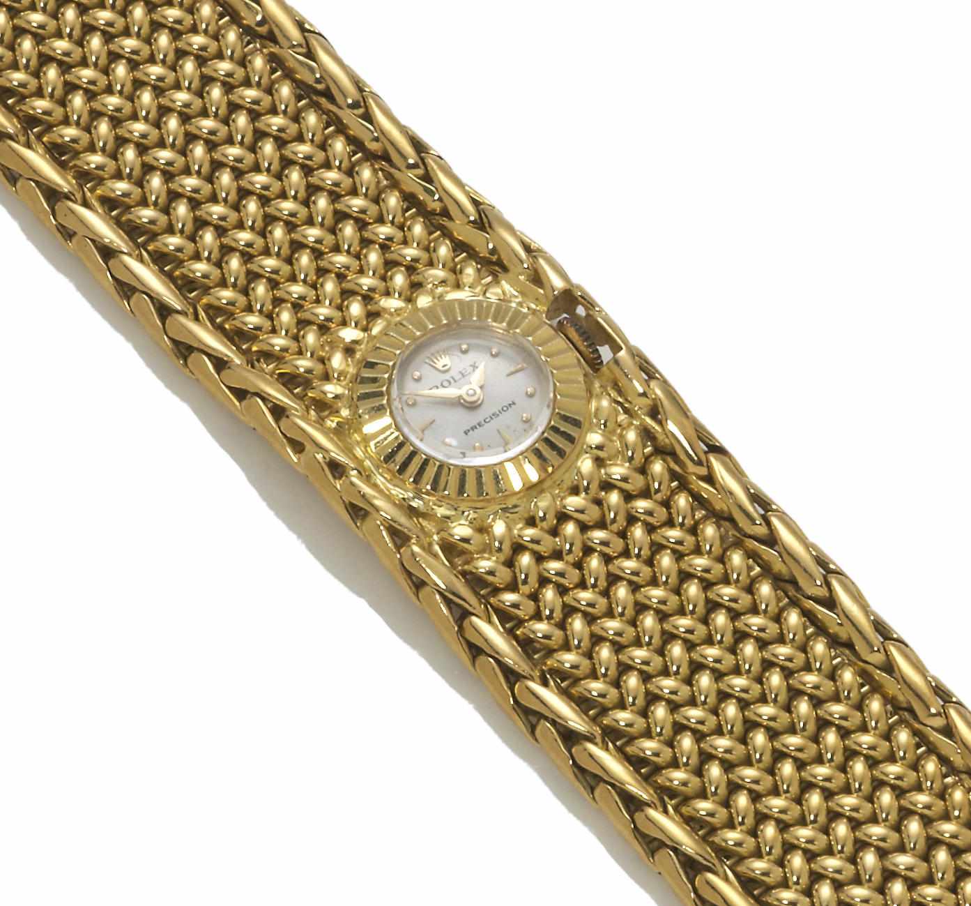 Appraisal: An eighteen karat gold integral bracelet wristwatch Rolex j round