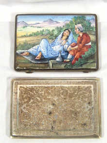 Appraisal: Two Persian silver cigarette cases one with an enamel romantic