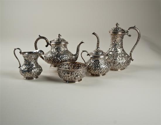 Appraisal: A Jacobi Jenkins Sterling Tea Coffee Service heavily repousseed to