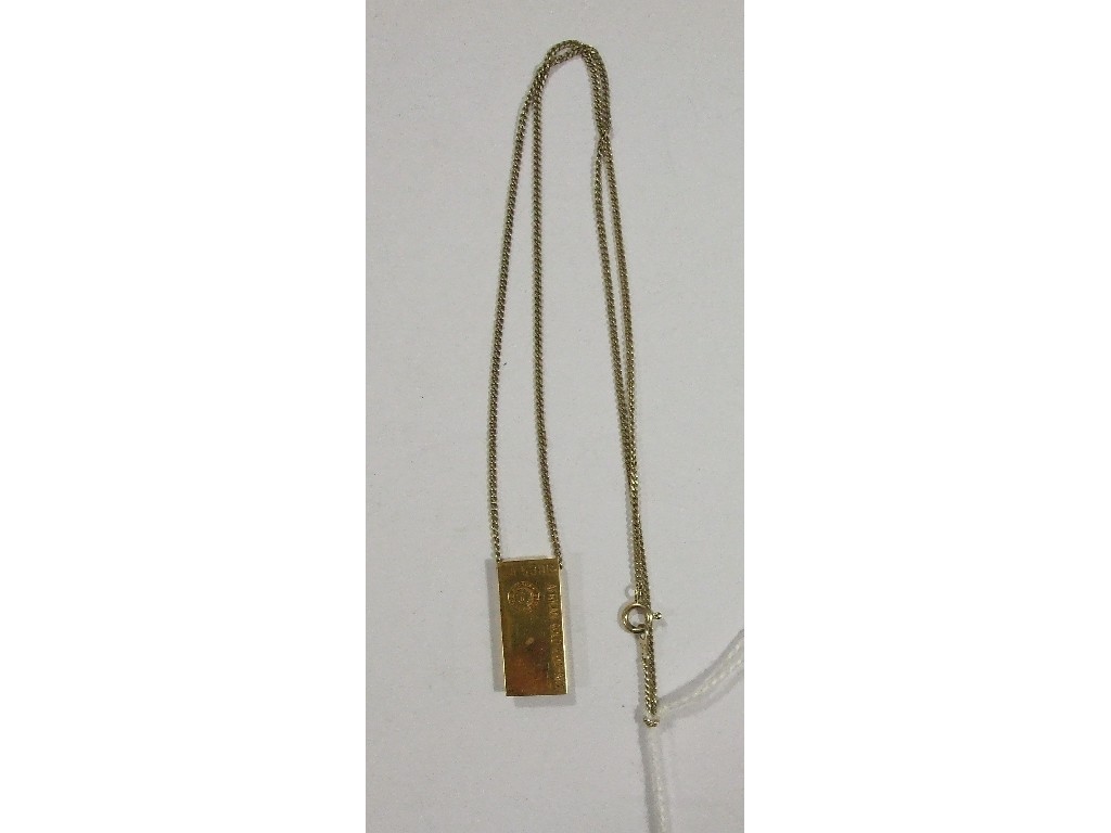 Appraisal: African gold bar pendant gms on silver neckchain