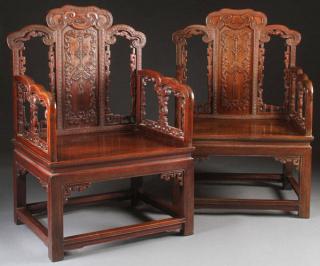 Appraisal: CHINESE CARVED ROSEWOOD ARMCHAIRS A FINE PAIR OF CHINESE QING