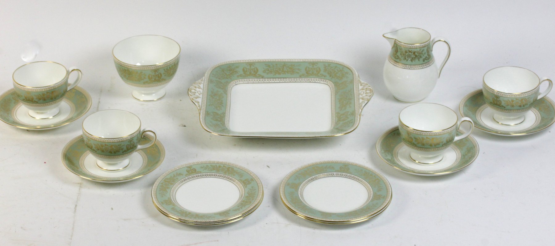 Appraisal: A Wedgwood Gold Columbia tea service with sage green and