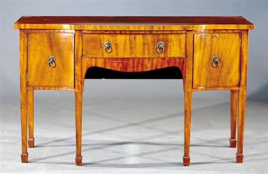 Appraisal: Georgian style serpentine mahogany sideboard late th century shaped top