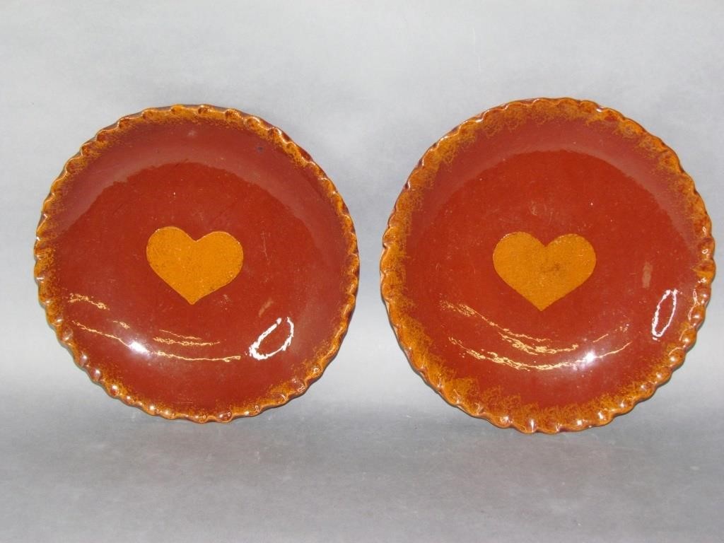 Appraisal: PAIR OF NED FOLTZ REDWARE PLATESheart designs no damage