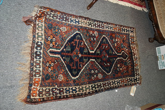 Appraisal: A SMALL HAMADAN BLUE GROUND RUG with central shaped medallion