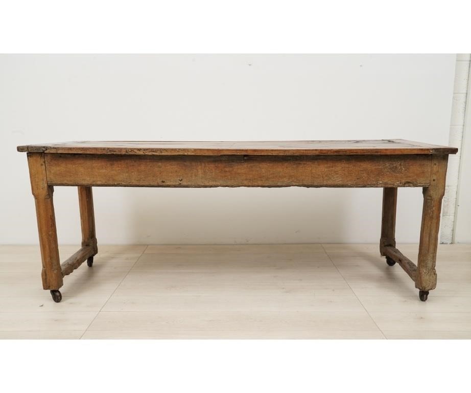 Appraisal: Continental primitive walnut harvest table th c with single drawer