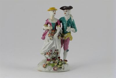 Appraisal: A Derby figure of two lovers the girl gathering flowers