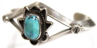 Appraisal: Navajo Silver Turquoise Cuff Bracelet The die-punched triangular bracelet with