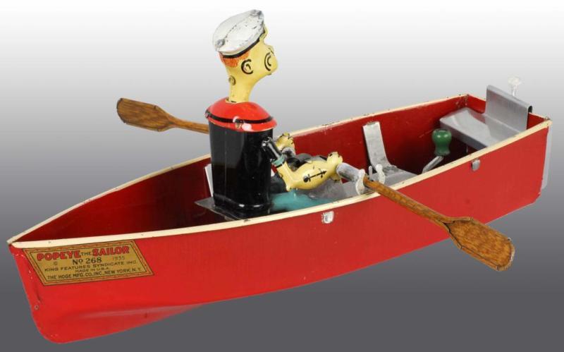 Appraisal: Pressed Steel Popeye Rowboat Wind-Up Toy Description Manufactured by Hoge