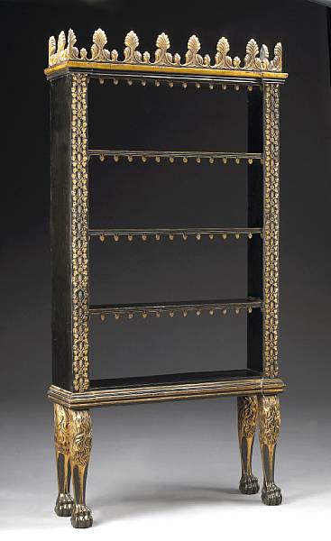 Appraisal: An Anglo-Indian parcel gilt ebonized bookcase circa The gilt anthemion