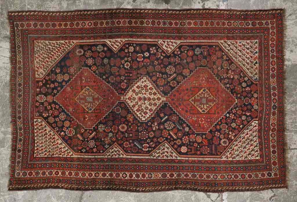 Appraisal: Caucasian rug geometric motifs three large medallions bird motifs Wear