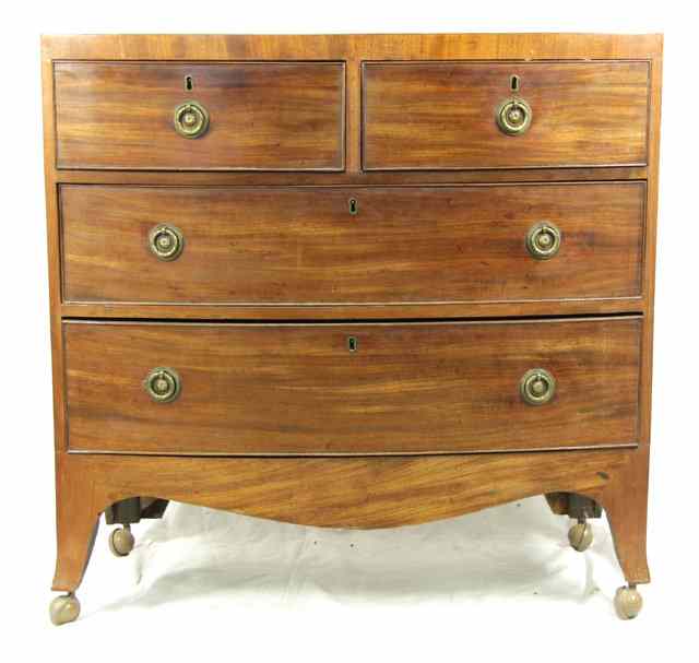 Appraisal: A small mahogany chest of two short over two long