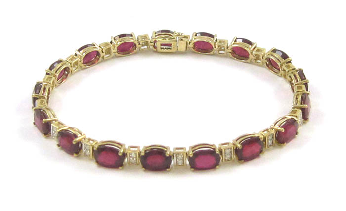 Appraisal: RUBY DIAMOND AND TEN KARAT GOLD BRACELET - inches in