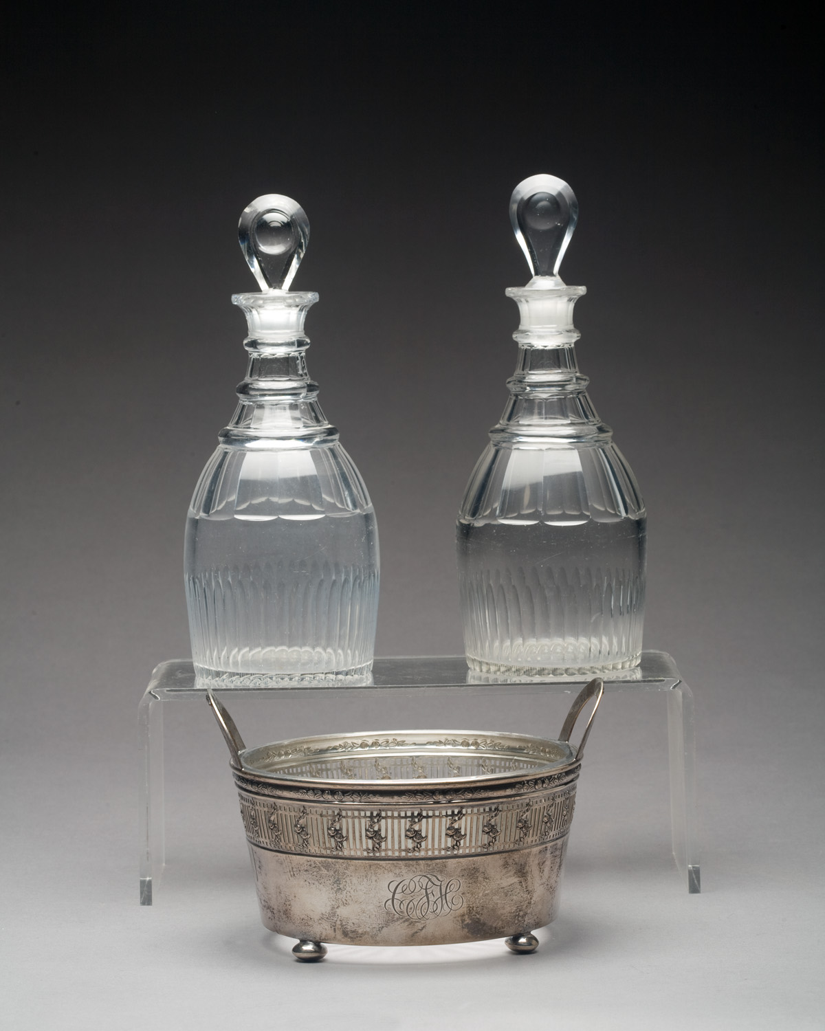 Appraisal: PAIR OF ENGLISH CUT-GLASS DECANTERS AND STOPPERS Together with an