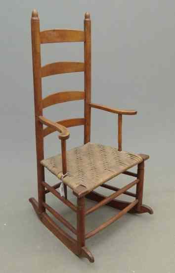 Appraisal: th c ladderback rocking chair '' Seat Ht '' Overall