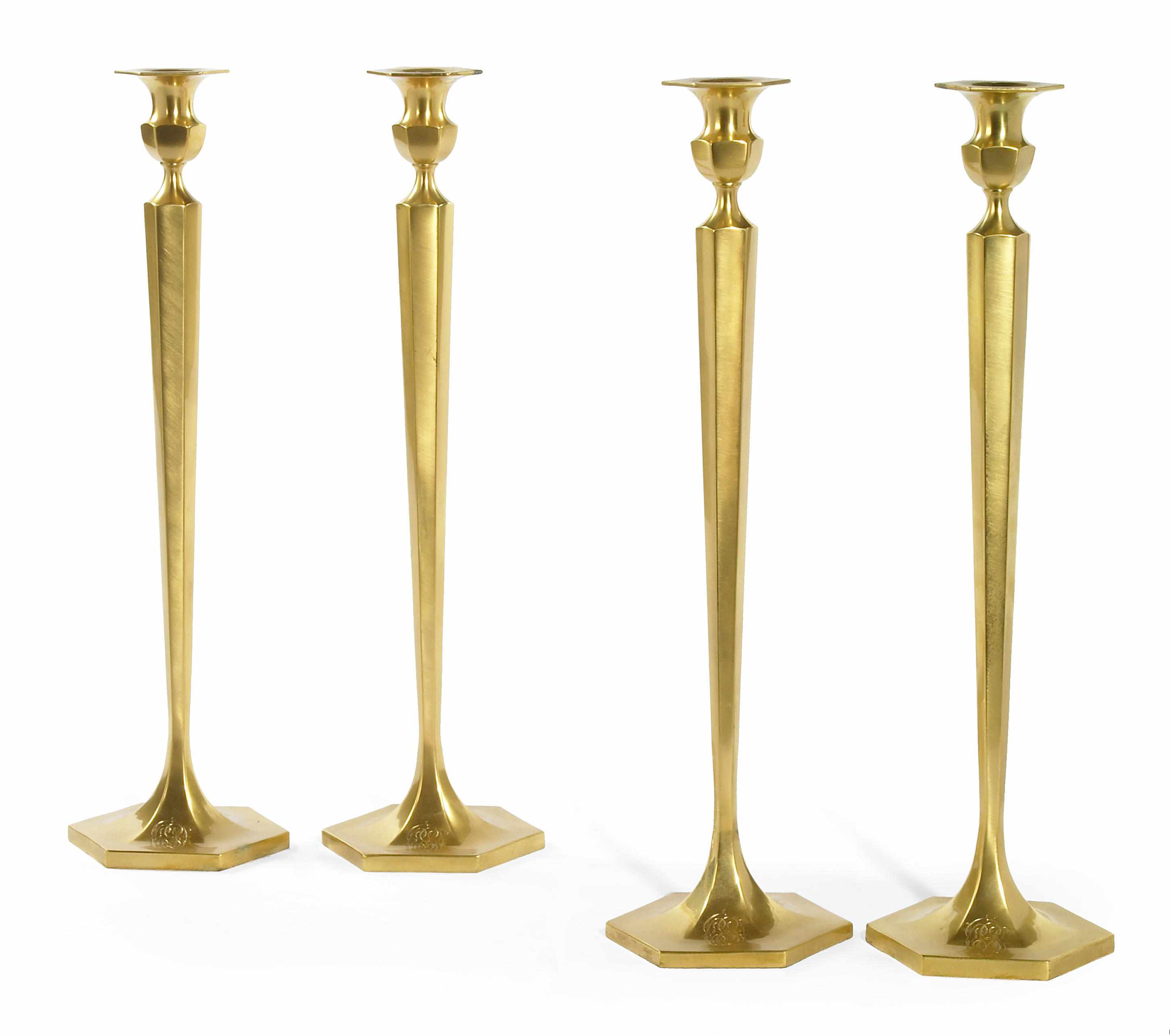 Appraisal: A set of four Neoclassical style gilt bronze candlesticks first