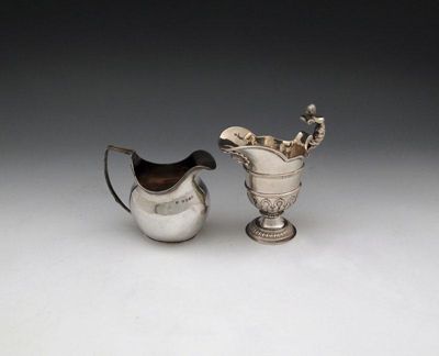 Appraisal: A George III silver cream jug maker's mark partially worn