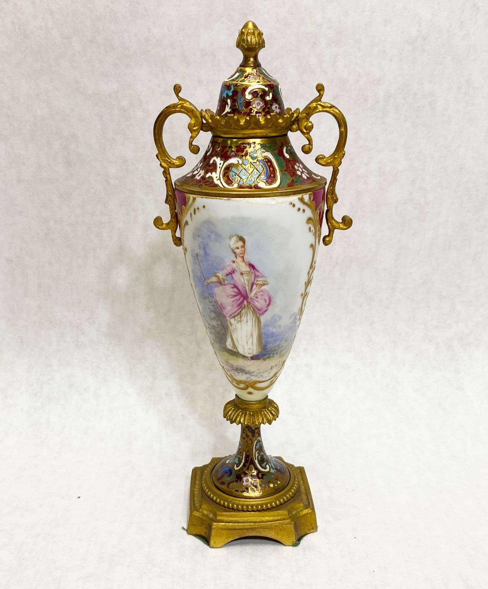 Appraisal: French Porcelain and Enameled Bronze Bolted Urn tall Condition Has