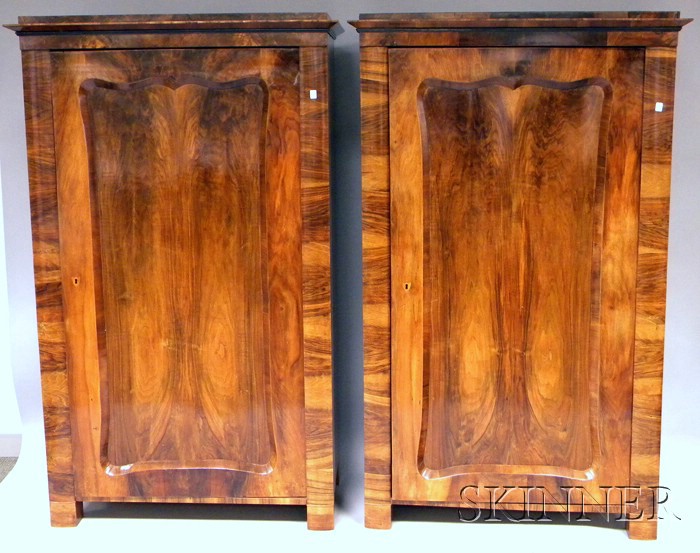 Appraisal: Pair of Continental Neoclassical Mahogany Veneer Linen Cabinets the interiors