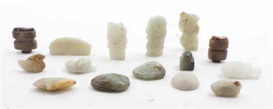 Appraisal: A Collection of Fifteen Jade Toggles of various forms and