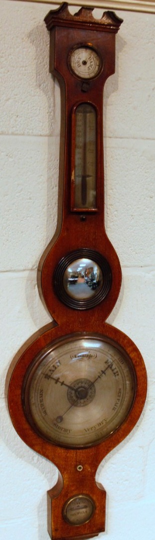 Appraisal: An early Edwardian mahogany and boxwood strung five dial banjo