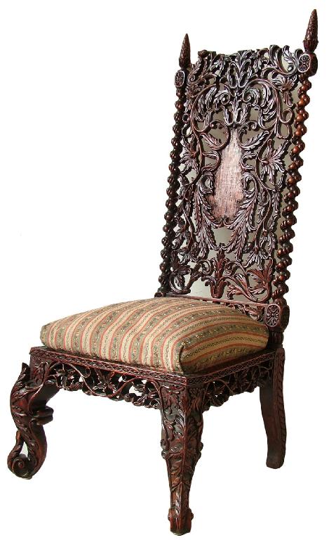 Appraisal: th century Eastern carved hardwood chair the back profusely carved