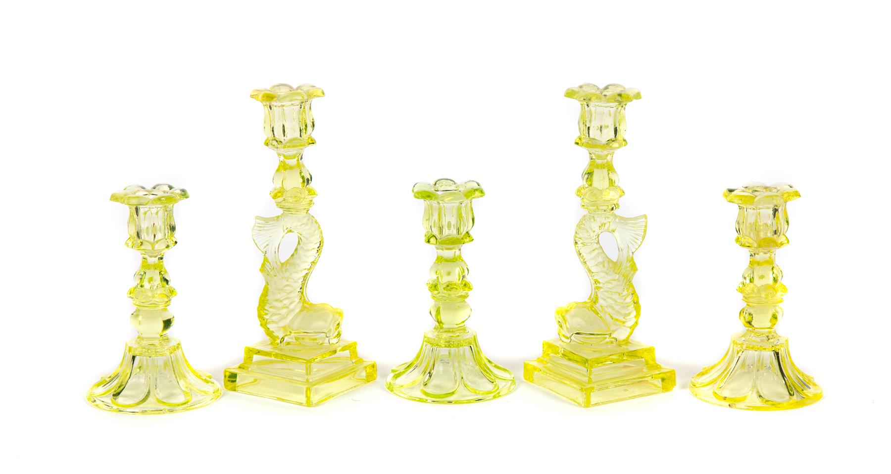 Appraisal: FIVE SANDWICH CANARY CANDLE STICKS American mid th century Pair