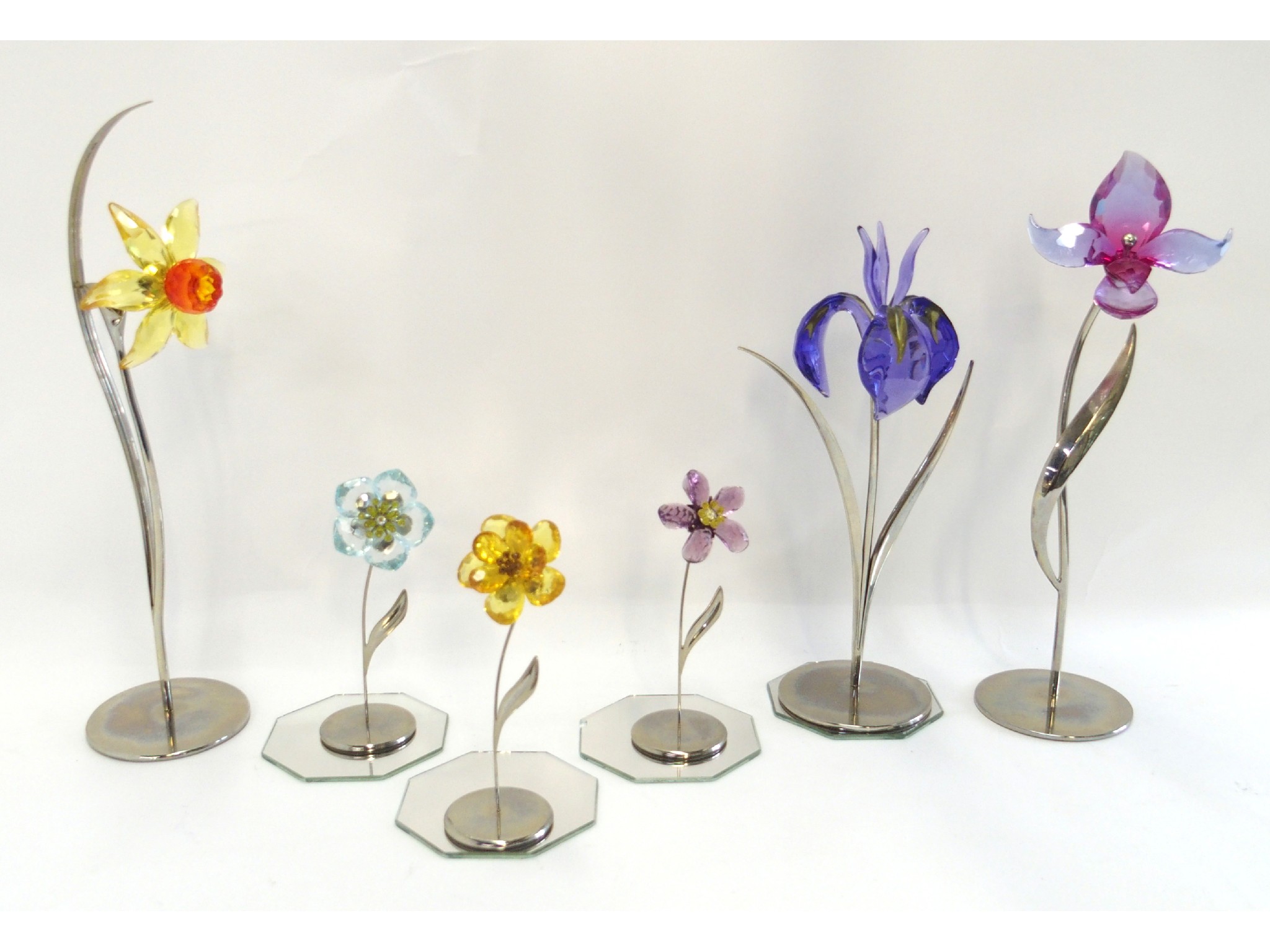 Appraisal: Six Swarovski exotic flowers including Dacali Light Topaz Damboa-Blue Violet