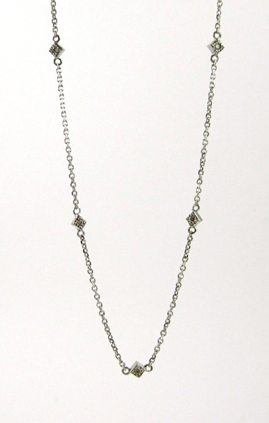 Appraisal: DIAMOND AND FOURTEEN KARAT WHITE GOLD CHAIN NECKLACE The -