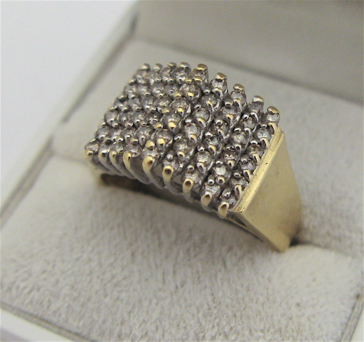 Appraisal: MAN'S DIAMOND AND KARAT GOLD RING set with round-cut diamonds